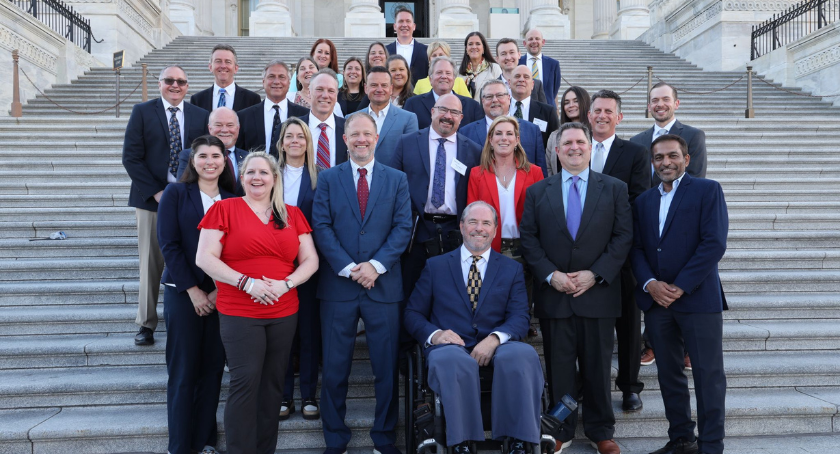 More than 40 attendees gathered on the Capitol steps after a productive day in Washington.